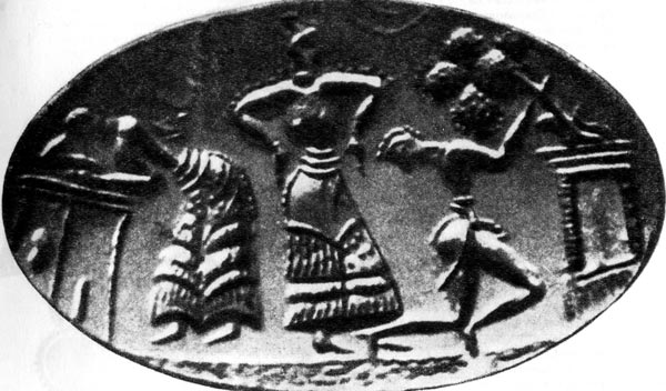 Сцена из танца. Барельеф, XVII - XIV вв. до н.э. Микены. На танцовщицах с обнаженной грудью длинные юбки с непропорционально пришитыми оборками